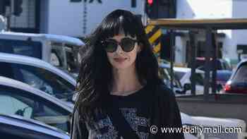 RJ Mitte's Breaking Bad costar Krysten Ritter surfaces in black after breaking silence on 'sweet' actor's 'devastating' suicide