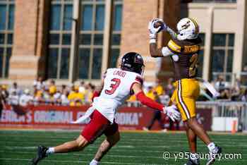 Hughes, Cowpokes Roll to 41-23 Win over Visiting NIU