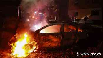 Blazes ignite at St. Petersburg oil sites as Kyiv launches more than 1,000 drones at Russia