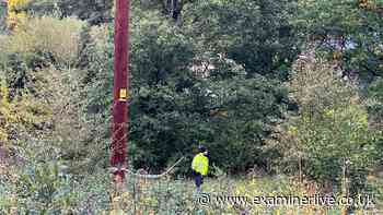 Honley LIVE as police surround 'white tarp' in woodland