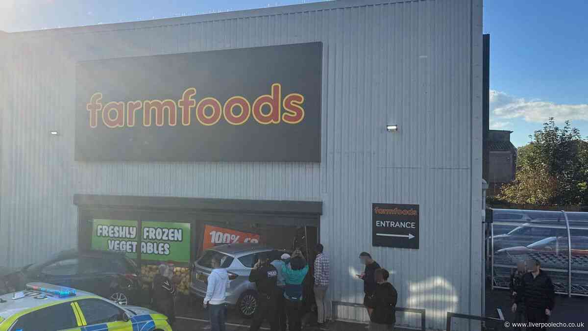 Police swarm Stoneycroft Farmfoods after car crashes into shop