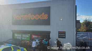 Police swarm Stoneycroft Farmfoods after car crashes into shop