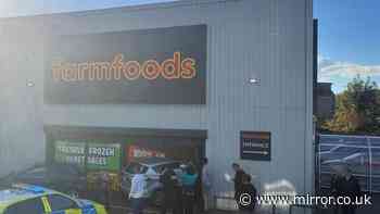 Police swarm Farmfoods after woman 'loses control' and crashes into supermarket