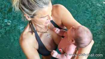Vogue Williams poses in a bikini with her newborn son Remy after giving birth just five weeks ago - as she enjoys family trip to Jersey