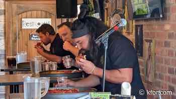 Joey Chestnut eats 8-pound pizza in just over 12 minutes