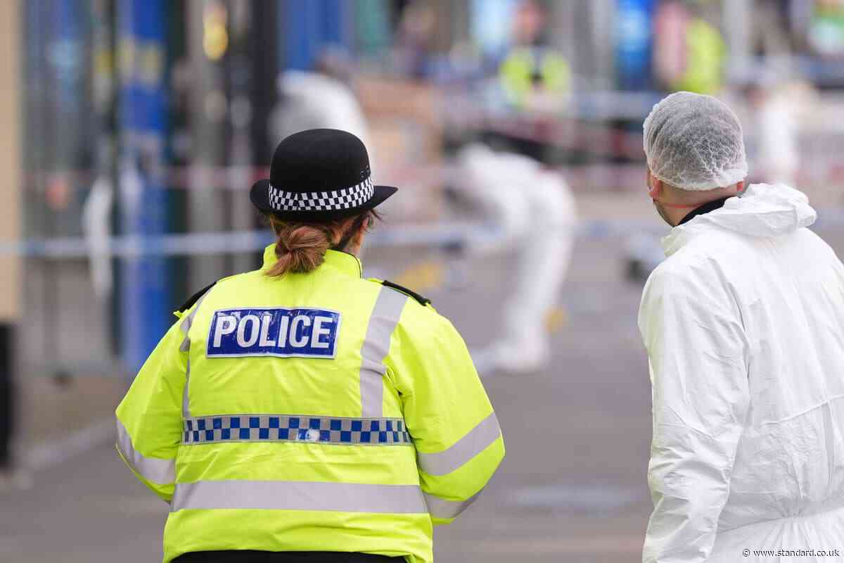 Police seek two suspects after officer shot in Nottingham city centre