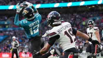 Hunter stars in Jags' loss, is 1st with INT and TD catch in game since '02