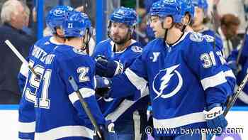 Lightning storm back from 2-goal deficit to beat the Canucks 4-2