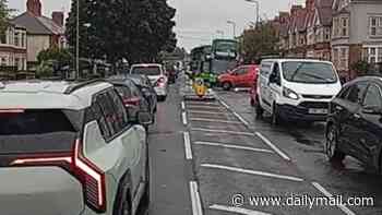 'Oxford has had it': Lib Dem council accused of crippling business and leaving city centre gridlocked with hated new anti-car permit scheme