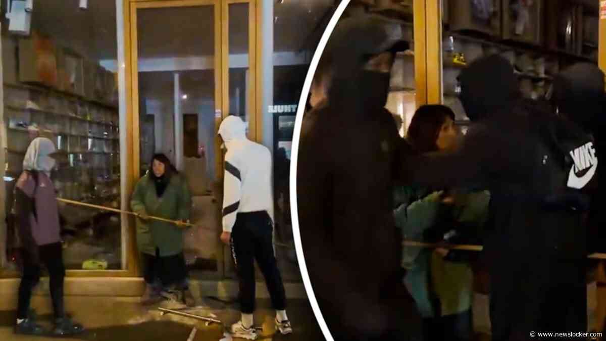 Winkeleigenaresse verdedigt haar winkel met een stok tijdens protesten Frankrijk
