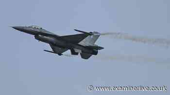 NATO warplanes scrambled and two airports shut as Russia attacks western Ukraine