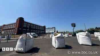 'Eyesore' sandbags removed from city island