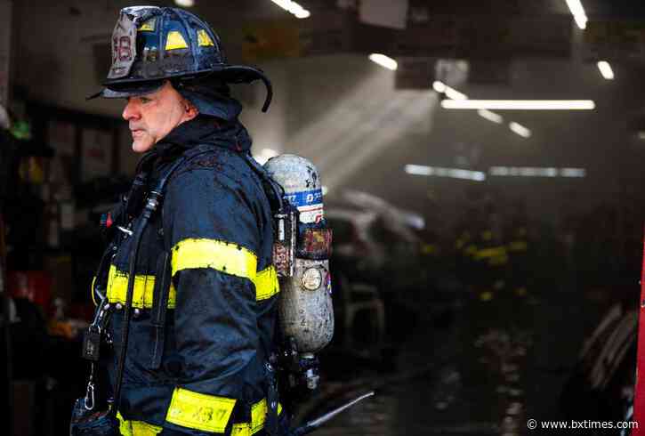 Firefighters contain Fordham auto body shop fire, rescue cat from building