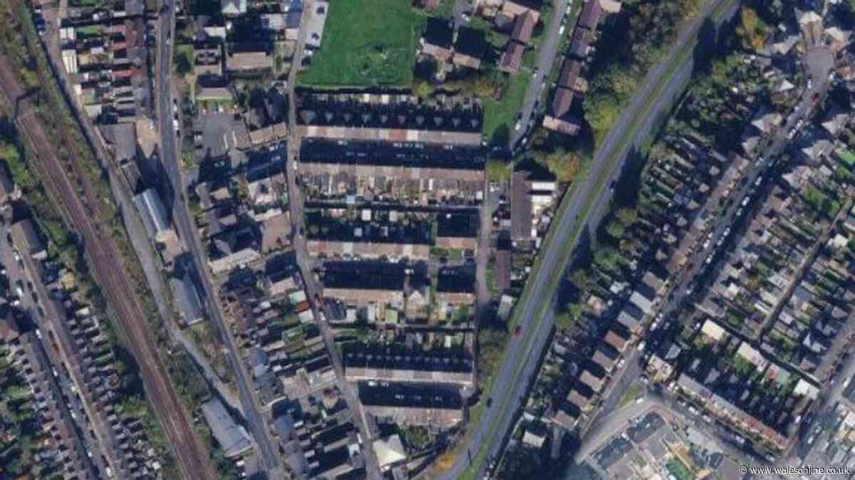 Police cordon off area in Bridgend and building evacuated after car crashes into wall