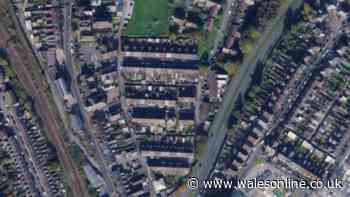 Police cordon off area in Bridgend and building evacuated after car crashes into wall