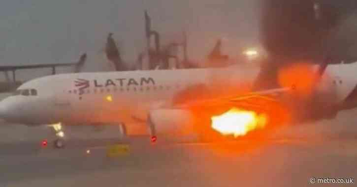 Passenger jet engine shoots out flames before takeoff