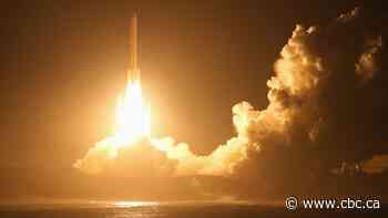 Japan launches spacecraft to mysterious moons of Mars