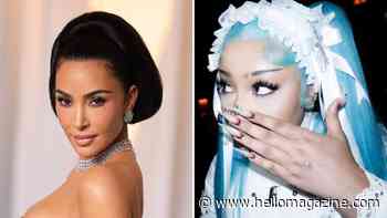 Unrecognizable Kim Kardashian 'scares' fans with face piercings and blue hair in dramatic transformation — see wild new photos