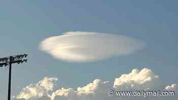 Eerie 'UFO cloud' over Washington DC sparks claim of cloaked alien craft hiding in the sky