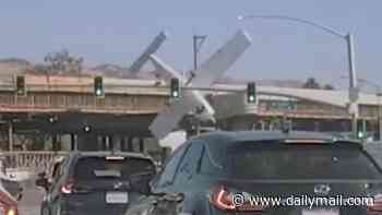 Dramatic moment plane smashes into overpass and crashes into traffic while trying to make emergency landing