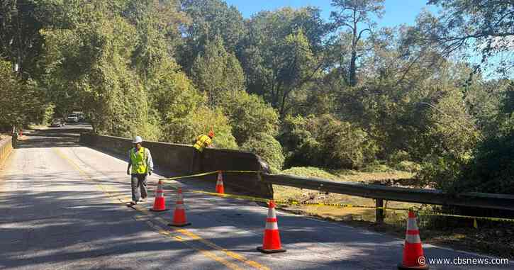 Atlanta bridge closed after vehicle damages water line, causes supporting structure to collapse