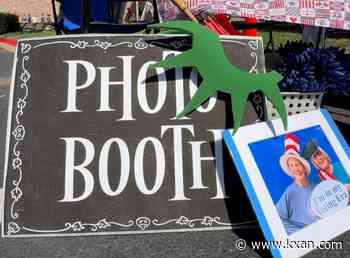 Volunteers set up homemade 'I Voted' photobooth at polling location