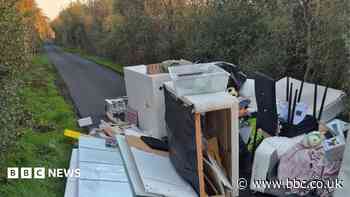 Fly-tip blocks road and prompts investigation
