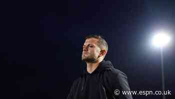 Wilshere in touchline scuffle after Luton win
