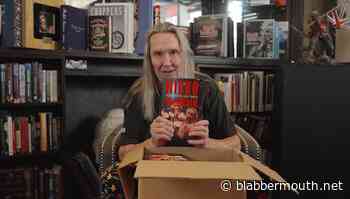Watch: IRON MAIDEN Drummer NICKO MCBRAIN Unboxes His Autobiography 'Hello Boys And Girls!'