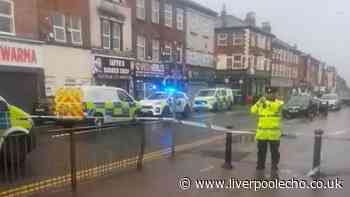 Breck Road assault LIVE as police cordon in place