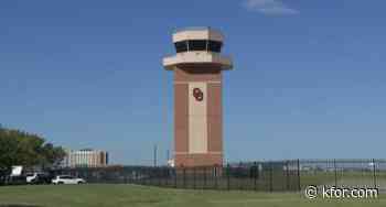 Officials cut the ribbon for Max Westheimer's new Air Traffic Control tower