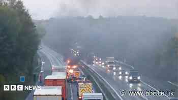 Motorway van fire leads to warnings of delays