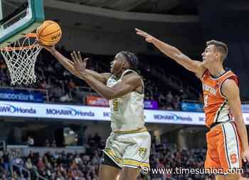 Siena men's basketball freshman Trent Egbiremolen off to promising start at both ends