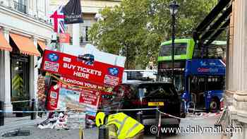 Double-decker tourist bus ploughs into souvenir stand near London's Trafalgar Square