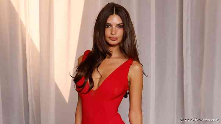 Emily Ratajkowski poses in plunging black swimsuit as she shares intimate photo with boyfriend