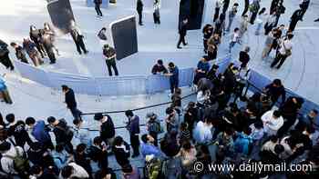 iPhone Duo goes on sale around the world: Huge queues form outside Apple Stores in London, Bangkok and Sydney as shoppers race to get their hands on the foldable device