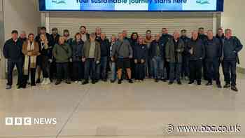 Football fans tackle 23-mile walk for veterans charity