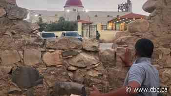 7 dead, 40 wounded after gunmen open fire during funeral at Greek Orthodox church in Jordan