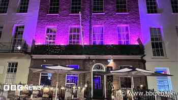 Why dozens of buildings are turning purple this month