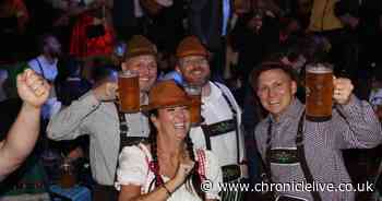 Steins in the storm! 26 photos of Oktoberfest in Newcastle as drinkers brave bad weather to party