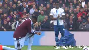 England defender Marc Guehi rejects the knee AGAIN: Man City star doubles down against anti-racism gesture after suggesting it had 'lost its meaning' - as Chelsea fans boo gesture before Spurs clash at Stamford Bridge