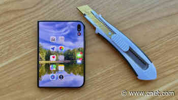 Man Destroys $2,000 iPhone Duo With Dirt, Fire, Knives and Medieval Chainmail