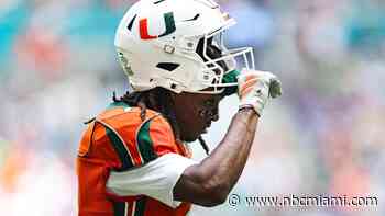 No. 1 Miami, in its first game atop AP poll since 2002 season, rolls past Pitt 52-23