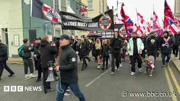 Pro and anti-immigration protesters march on coast