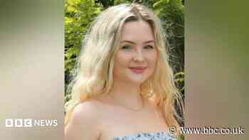 Driver charged after woman killed in car crash