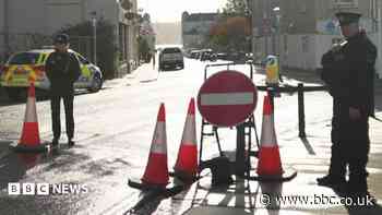 Murder charge after body found in wheelie bin