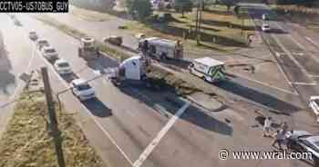 Tractor-trailer crash closes part of US-70W Business