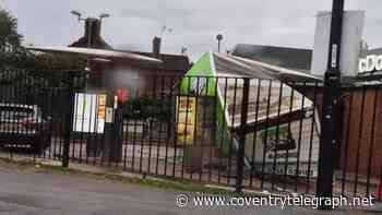 Van roof crushed in drive-thru crash at Coventry McDonalds