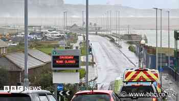 Beach road may close as high tides bring flood risk