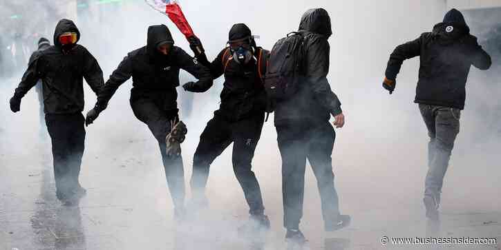 Storefronts close as police in Paris fire tear gas and water cannons on protesters